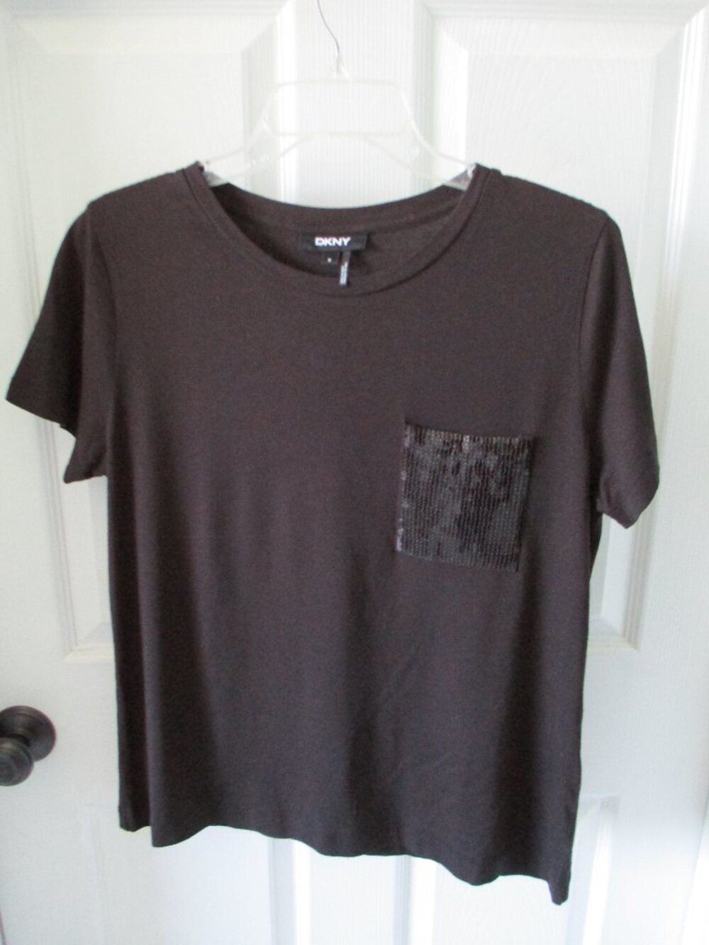 DKNY black t-shirt with sequined pocket